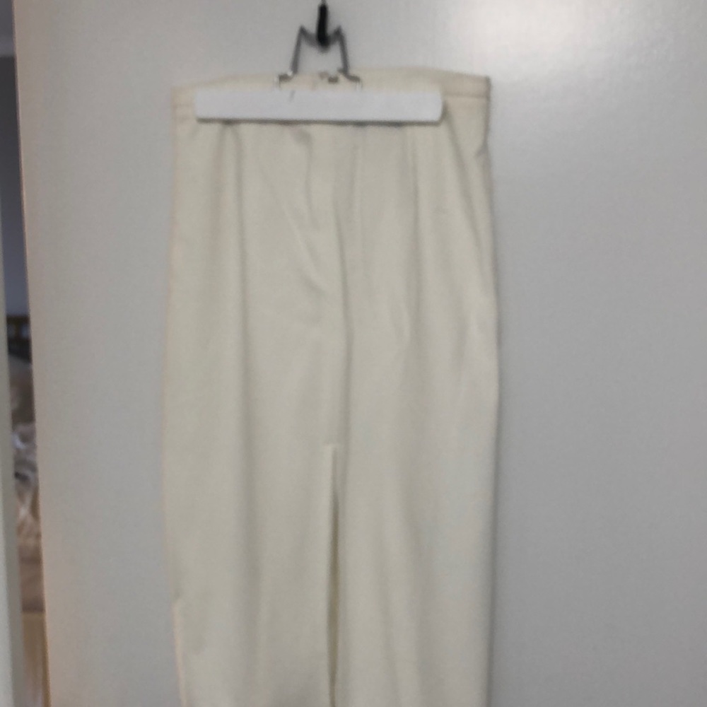 Fitted body, con, pencil skirt, Front and back slits